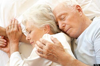 Older couple getting some Zzzzz's.