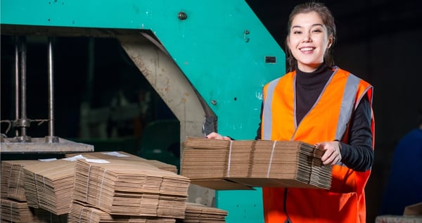 Girl working in paper making factory