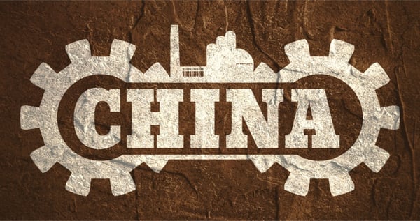 Factory cogs wrapping the text "China"