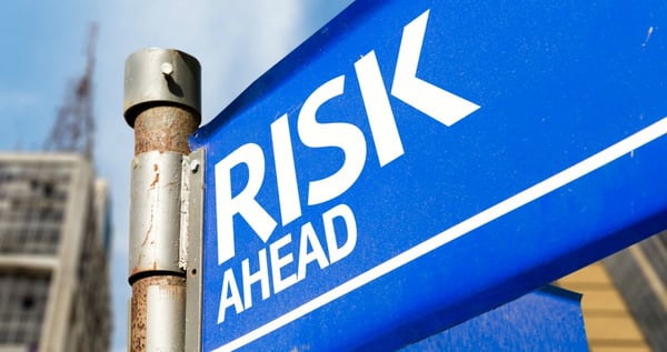 Sign saying "Risk Ahead"