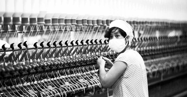 Surprised Chinese factory worker bw