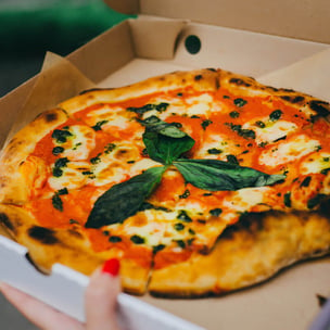 celebrate national pizza day - photo by Alexandra Gorn via unsplash