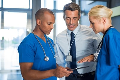 bigstock-Medical-team-interacting-using-188816575