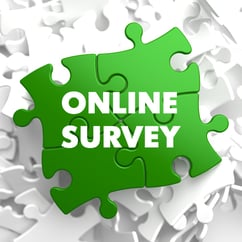 Online Survey on Green Puzzle on White Background.