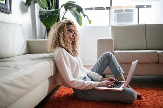 Woman on floor with laptop