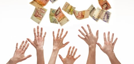 hands reaching for money
