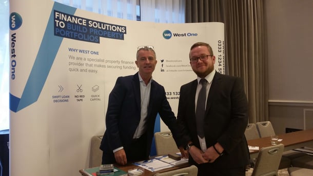 west one loans team at property auction house with bridging loans