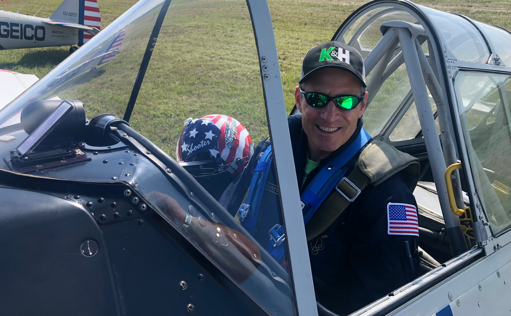 Mike Brockey of Kelly & Hayes sits in the cockpit of a WWII warbird. He flies for fun on weekends.