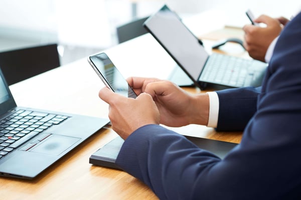 hands holding mobile phone | createch.ca