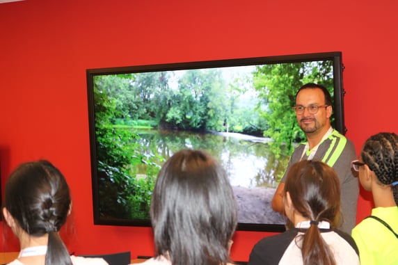 Mr. Correa shows a video of the Deerfield River