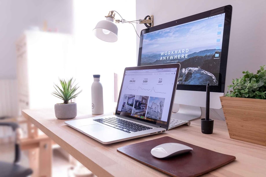 Laptop and monitor set up on desk