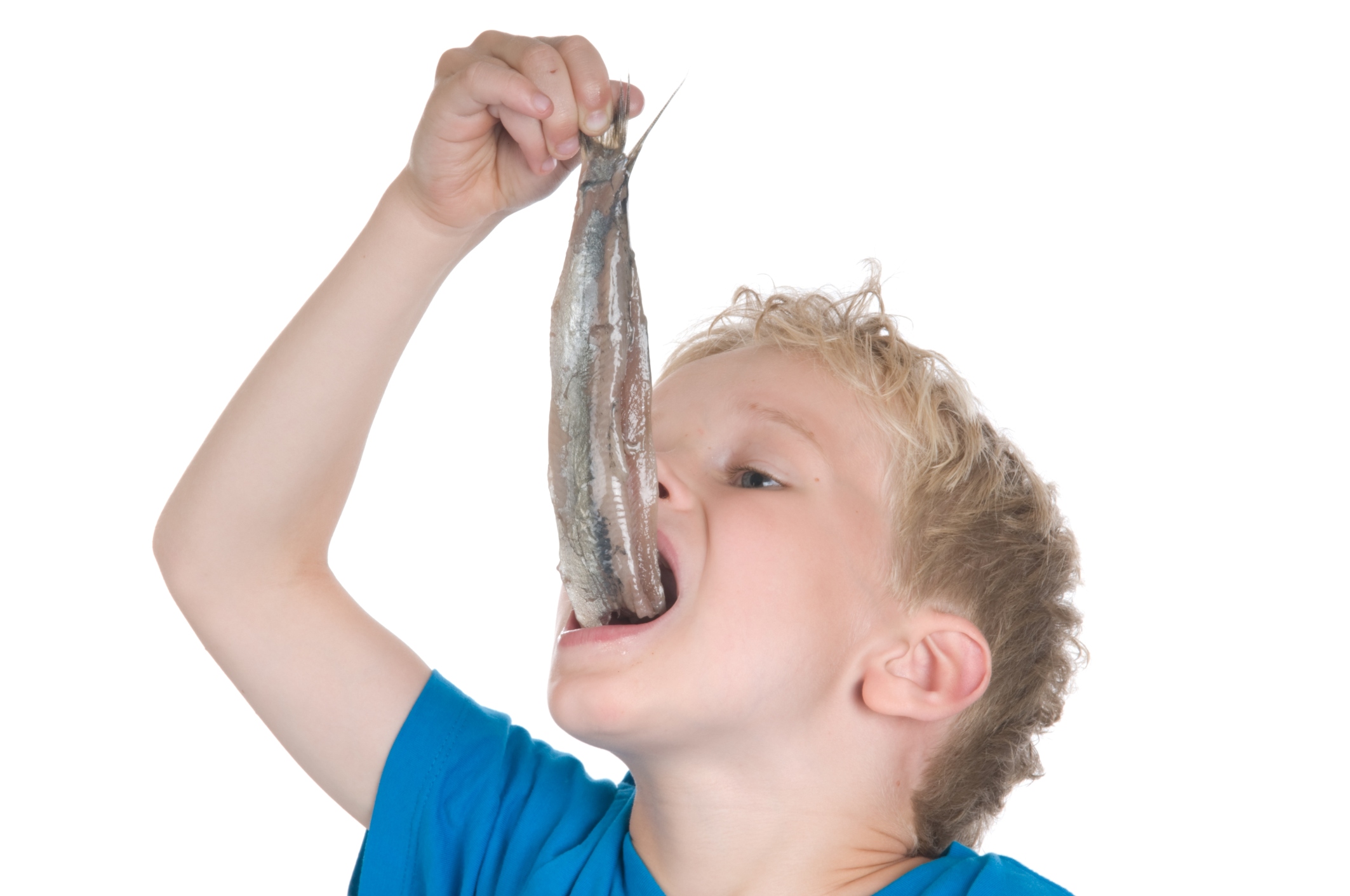boy_eating_fish.jpg