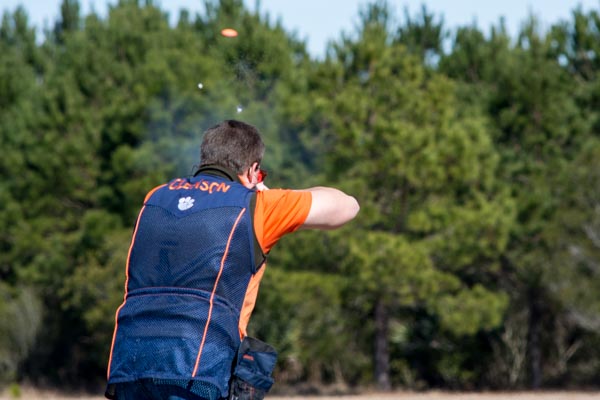 college students shooting the clay.