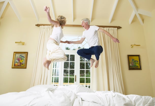 Couple Jumping On Bed Image number: 1828R-11723 License type: Royalty Free Credit: Radius