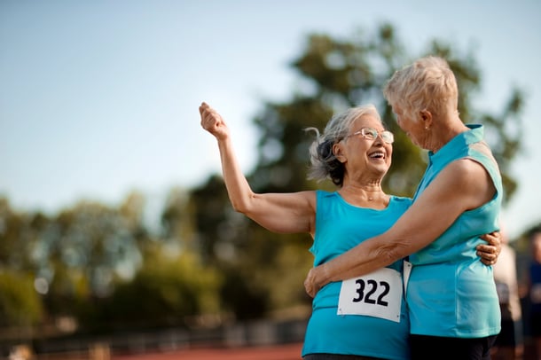  Two happy senior women embracing after competing in an athletic event. Image number: 4463R-21391708 License type: Royalty Free Credit: Erickson Productions Inc