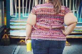 bigstock-Obese-woman-at-a-carnival-122842076.jpg