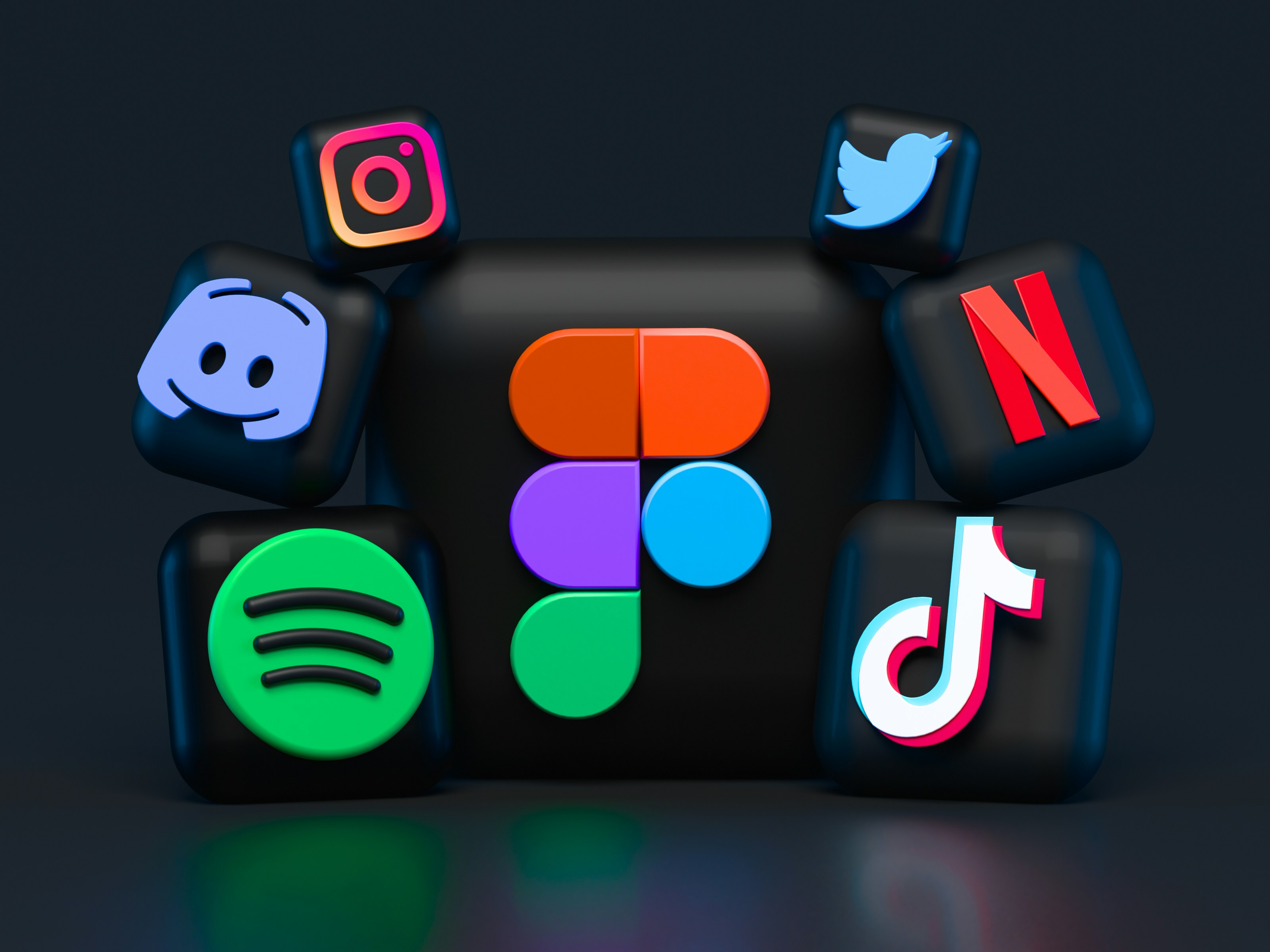 A collection of social media platform logos rendered in 3D. 