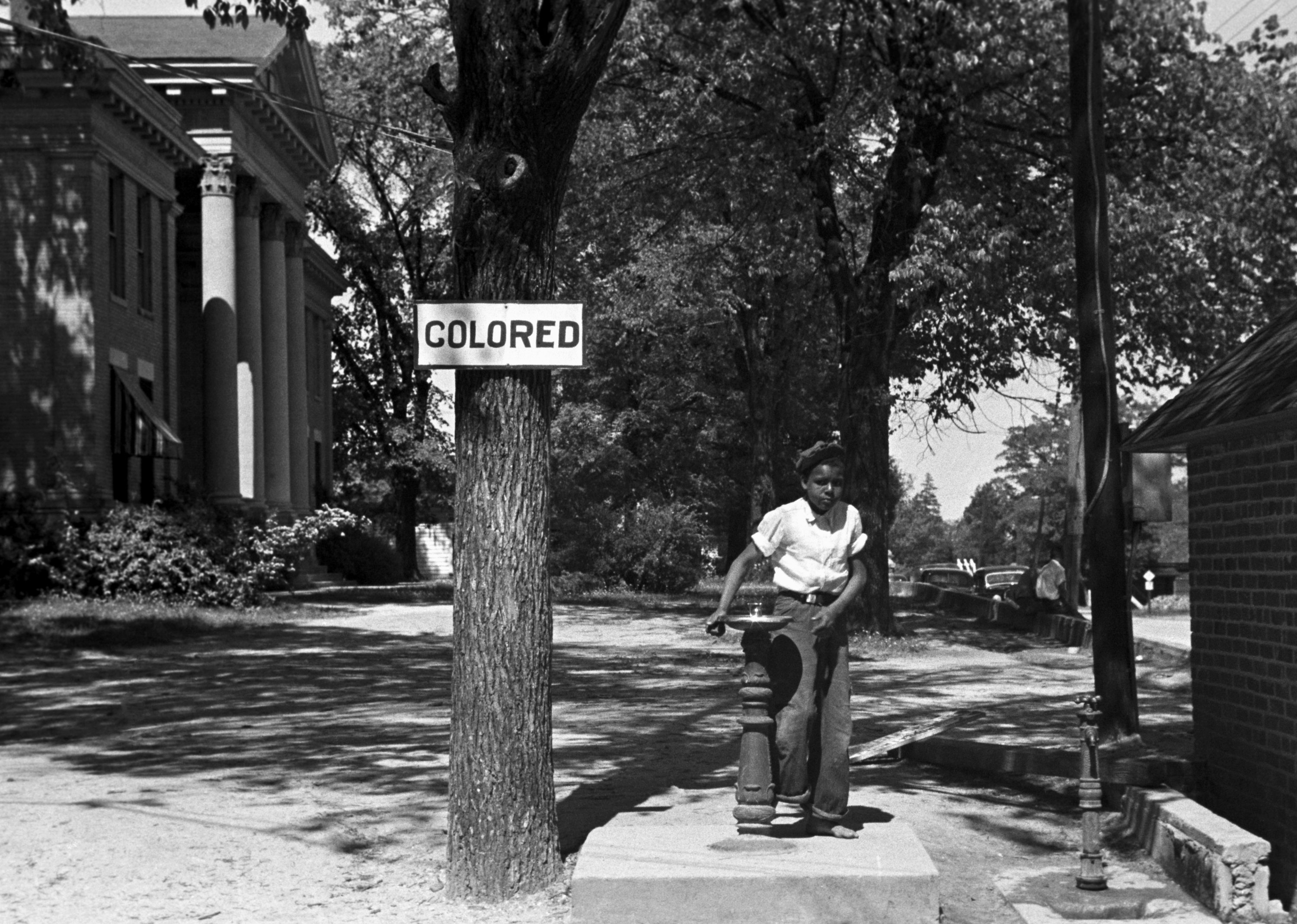 racism examples in to kill a mockingbird