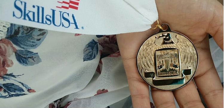 Angelina's Rhode Island Skills USA Gold Medal for Collegiate Culinary Arts. Credit Image: Angelina Jorge
