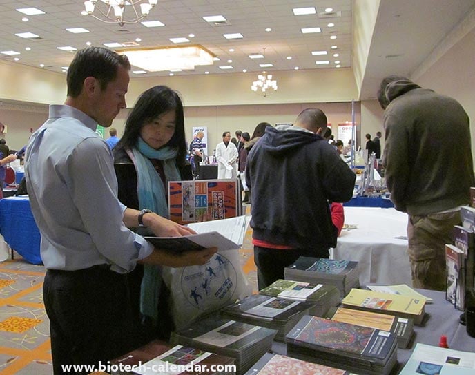 University researchers looking at some life science magazines.