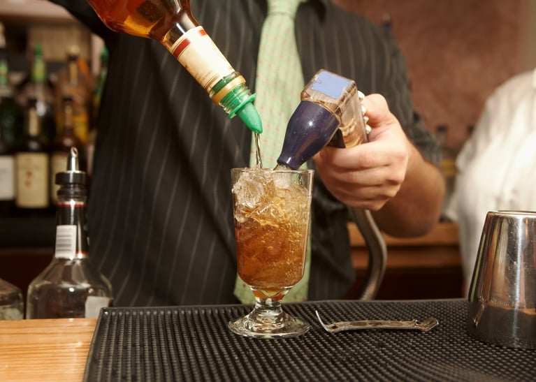 bigstock-Bartender-Pouring-Drink-3923583-1260x900