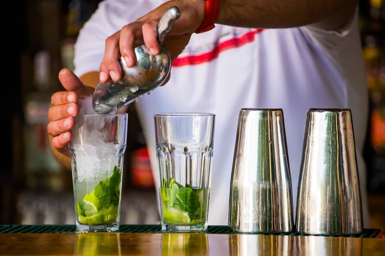 bigstock-barmen-mixes-a-cocktail-33182216-1350x900