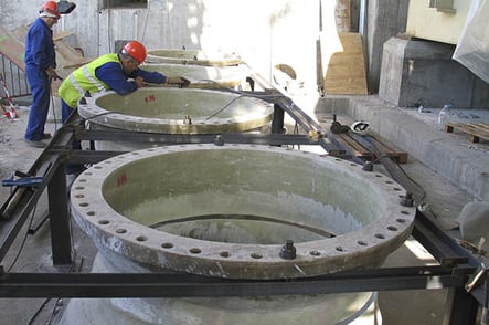Reposicionamiento de bridas en FRP para una central térmica de ciclo combinado.