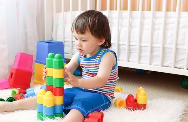 Child learning with toys