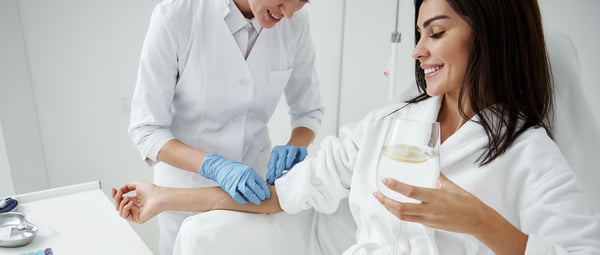 Young women receiving iv vitamin drip