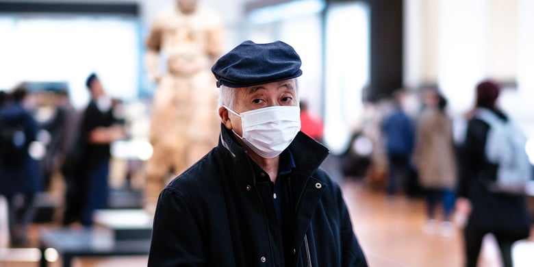 Man wearing a mask to protect himself from the 2019 Wuhan coronavirus (2019-nCoV)