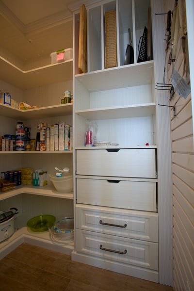Latitude North Pantry with Corner Radius Shelves, Decorative Base and Crown Moulding, Raised Panel Drawers, Tray Storage and Pullouts