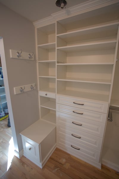 White Walk In with Raised Panel Drawers, Hook Strips, Adjustable Shelving Decorative Base and Crown Moulding
