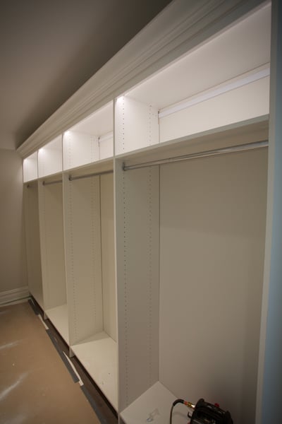 White Walk In with Long Hang Sections, LED Closet Lighting, Decorative Crown Moulding