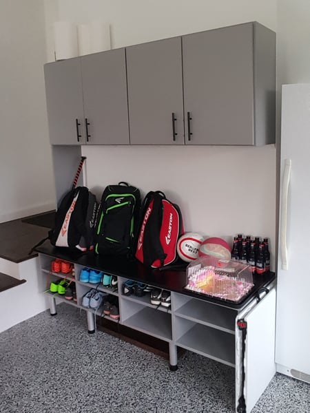 Grey Mudroom Section with Bench Seat, Adjustable Shoe Shelving, and Overhead Storage with Matte Black Ladder Pulls