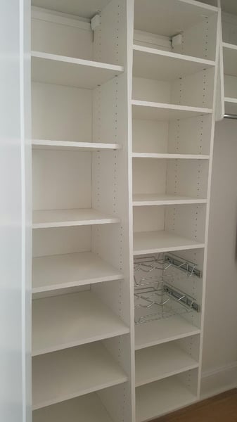 White Pantry with Wine Rack Pullouts and Adjustable Shelving