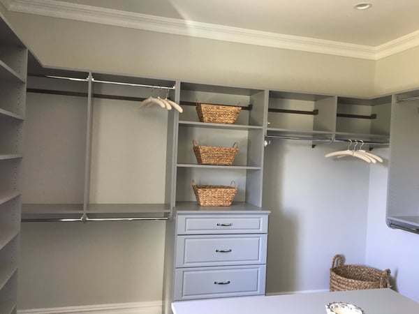 Grey Walk in Closet with Raised Panel Drawers and Island