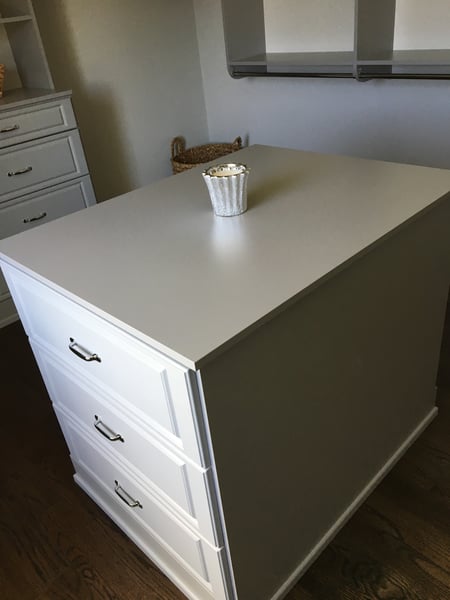 Grey Walk in Closet with Raised Panel Drawers and Island