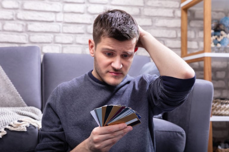 bigstock-Stressed-Man-Looking-At-Too-Ma-301530235-768x512