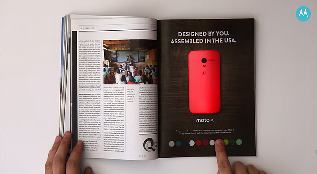 Interactive print advertisement by Motorola and Wired Magazine that changes the smartphone's color on the page