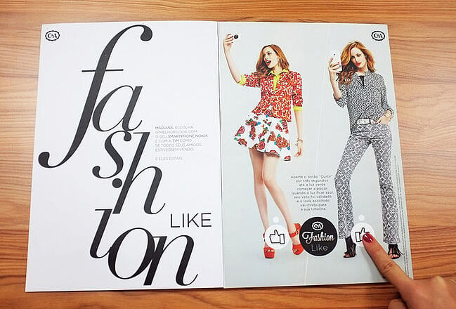 Interactive print advertisement by C&A fashion featuring printed social media Like buttons