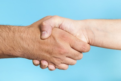 handshake-blue-background