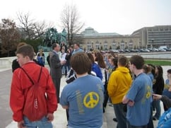 A group of students get a campus tour. Link goes to Student Aid's page on college questions.