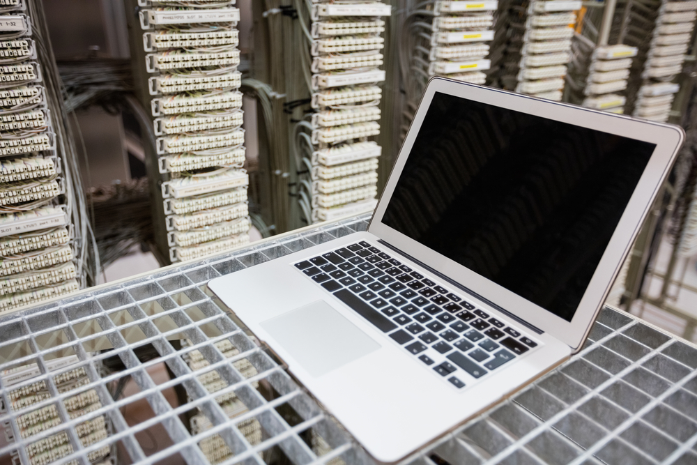 Laptop kept on rack in server room