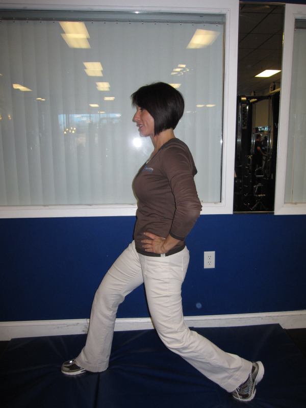physical therapist performing a stretch