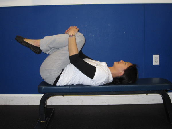 physical therapist performing a stretch