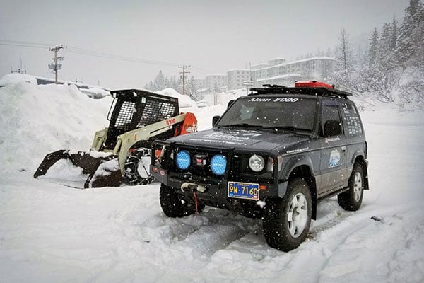 Pajero-next-to-running-skid-steer-in-Whittier-Alaska-1