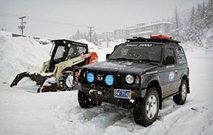 Pajero-next-to-running-skid-steer-in-Whittier-Alaska-2