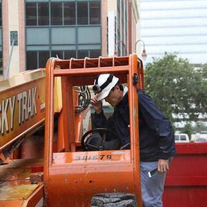 Vuk-inspecting-Boom-LIft1