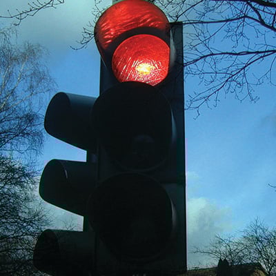 driver-runs-red-light-crashes-into-man