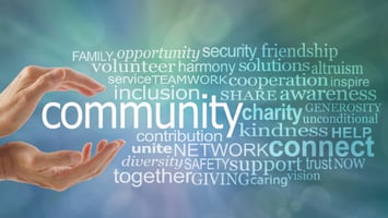 hands holding community, advocacy, charity